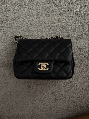 CHANEL Black Quilted Lambskin Small Flap Bag with Gold Hardware